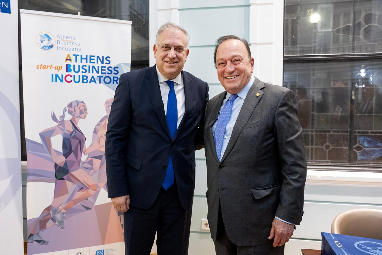 a couple of men in suits